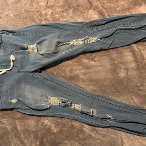 Women's Distressed Blue Jeans